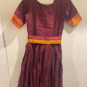 Brown traditional Indian one piece gown in the size Small.